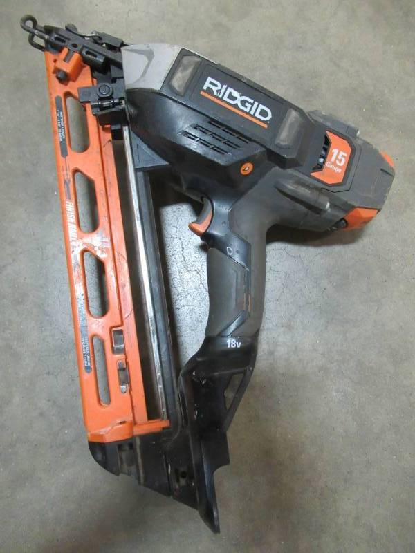 lot 151 image: RIDGID 18-Volt Cordless 15-Gauge Angled Nailer, R250AF18. IN USED WORKING CONDITION
