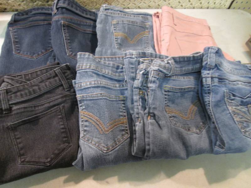 8 Pairs of LadiesTeen Jeans Size 1...