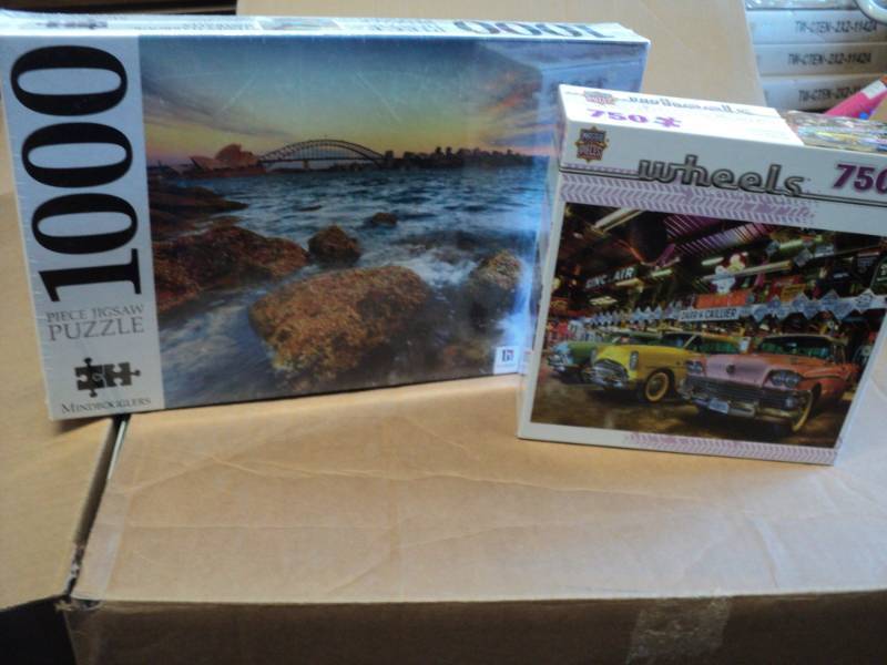 lot 41 image: 2 Puzzles- 1000 and 750 pieces...