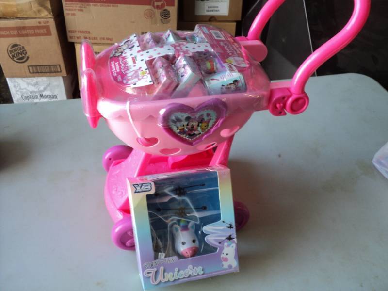 lot 105 image: Minnies Shopping Cart and Flying U...