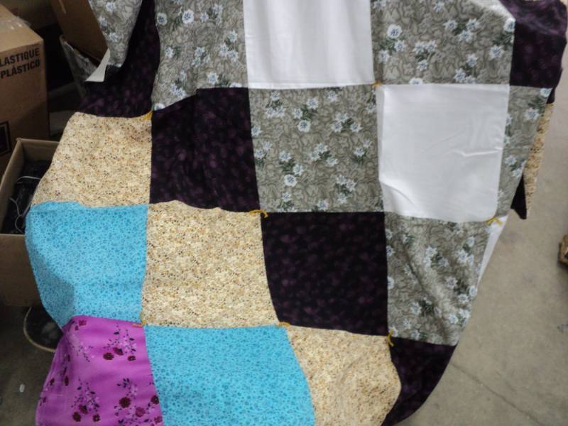lot 26 image: 3 new Quilts- Lightweight, most 60 ...