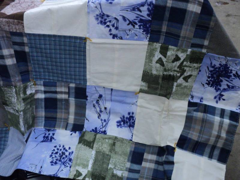 lot 27 image: 3 new Quilts- Lightweight, most 60 ...