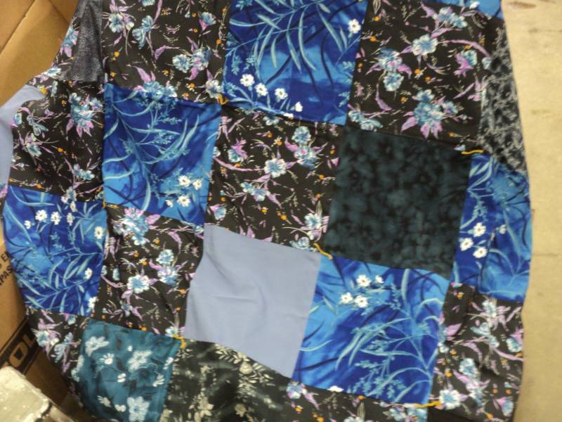 lot 28 image: 2 new Quilts- Lightweight, most 60 ...