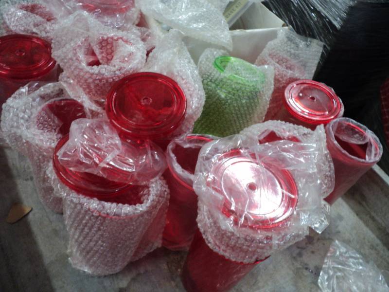 lot 57 image: Red and Green Mugs with Covers...