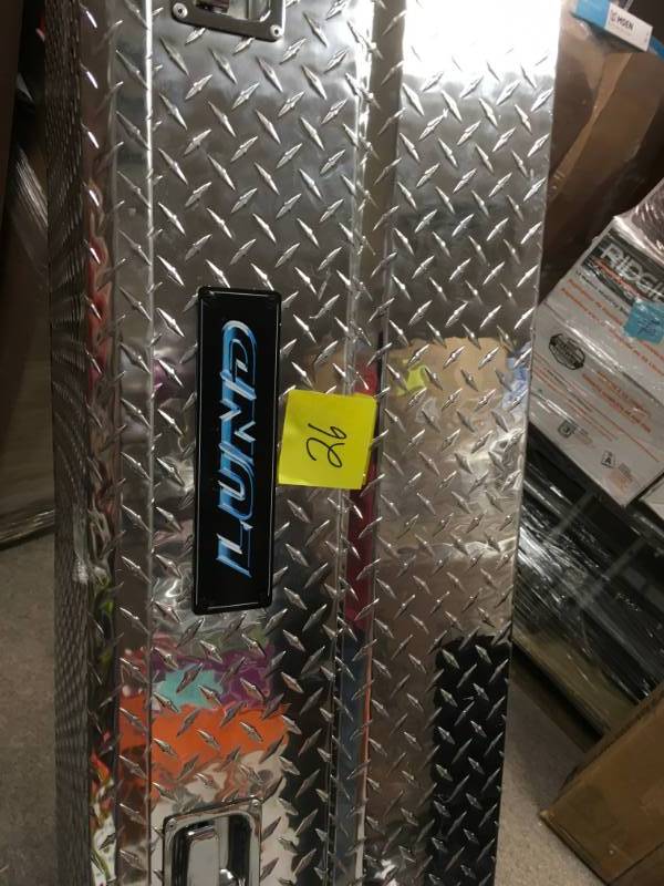 lot 26 image: Lund 60 in. Flush Mount Truck Tool Box in good condition see pictures