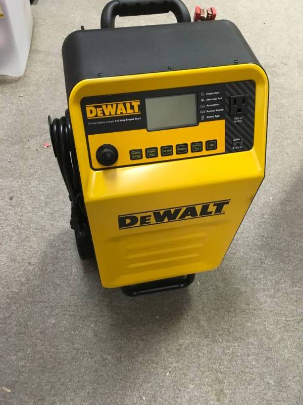 lot 69 image: DEWALT 70 Amp Wheel Charger with 200 Amp Engine Start in good working condition