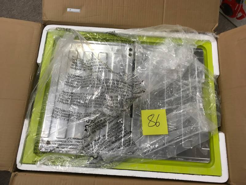lot 86 image: RYOBI 7 in. 4.8 Amp Tabletop Tile Saw USED in good working condition