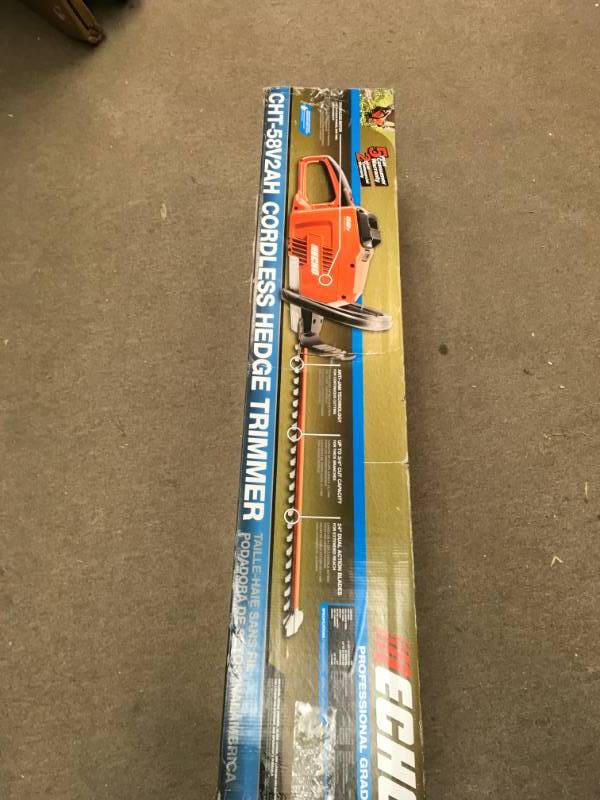lot 88 image: ECHO 24 in. 58-Volt Lithium-Ion Brushless Cordless Hedge Trimmer - 2.0 Ah Battery and Charger Included  in good working condition