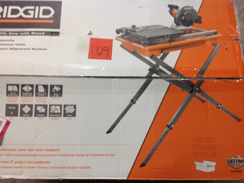 lot 109 image: RIDGID 7 in. Tile Saw with Stand in good working conditions
