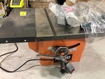 lot 116 image: RIDGID 13 Amp 10 in. Professional Cast Iron Table Saw no working conditions missing parts