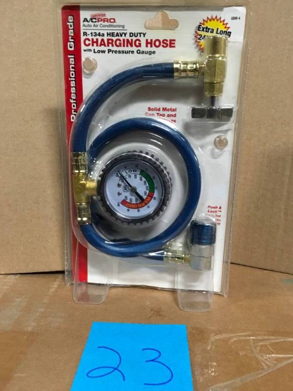 lot 23 image: AC Pro 24 in. R-134 Heavy Duty Charging Hose with Low Pressure Gauge in very good condition