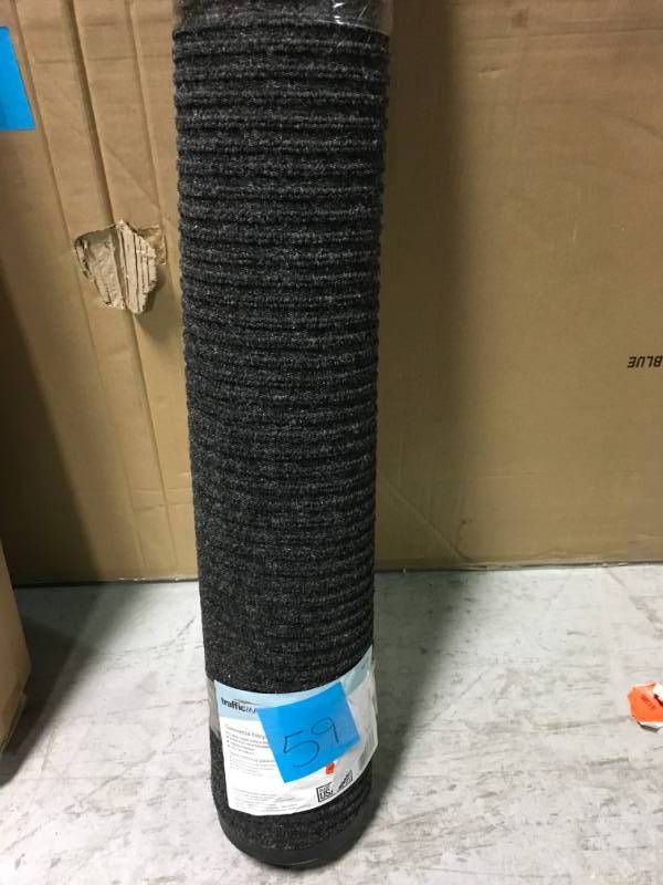 lot 59 image: TrafficMASTER Enviroback Charcoal 60 in. x 36 in. Recycled RubberThermoplastic Rib Door Mat in very good condition