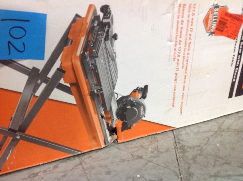 lot 102 image: RIDGID 7 in. Tile Saw with Stand in good working conditions