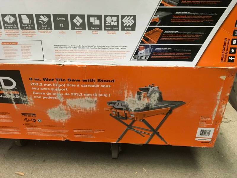 lot 46 image: RIDGID 12 Amp Corded 8 in. Wet Tile Saw with Stand  in very good condition