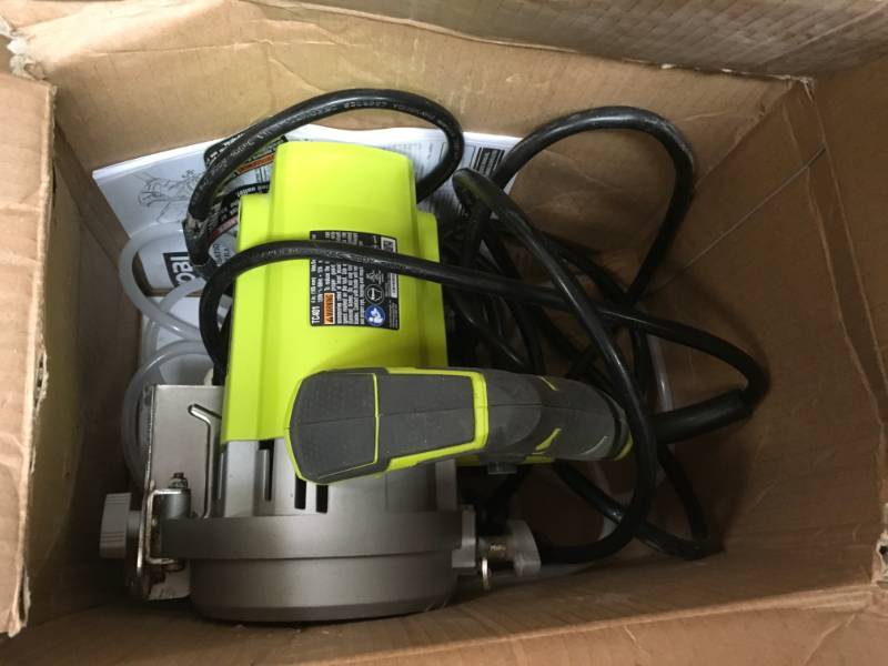 lot 68 image: RYOBI 4 in. Tile Saw  in very good condition