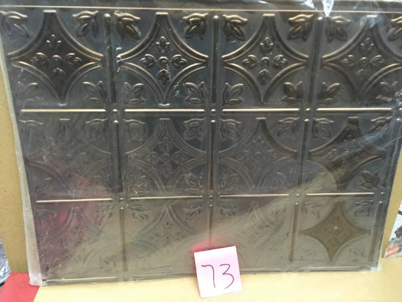 lot 73 image: Fasade 18 in. x 24 in. Decorative Backsplash Panel in Oil Rubbed Bronze 5 PCS  in very good condition