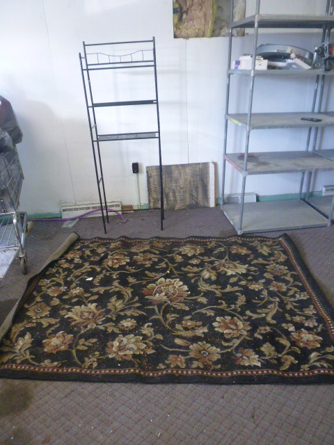 lot 49 image: Area Rug and Plant Rack