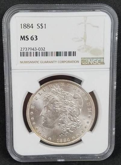 lot 4 image: 1884 MS 63 Slabbed Morgan Silver Dollar