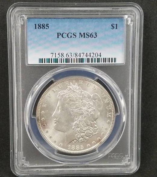 lot 8 image: 1885 PCGS MS 63 Morgan Silver Dollar