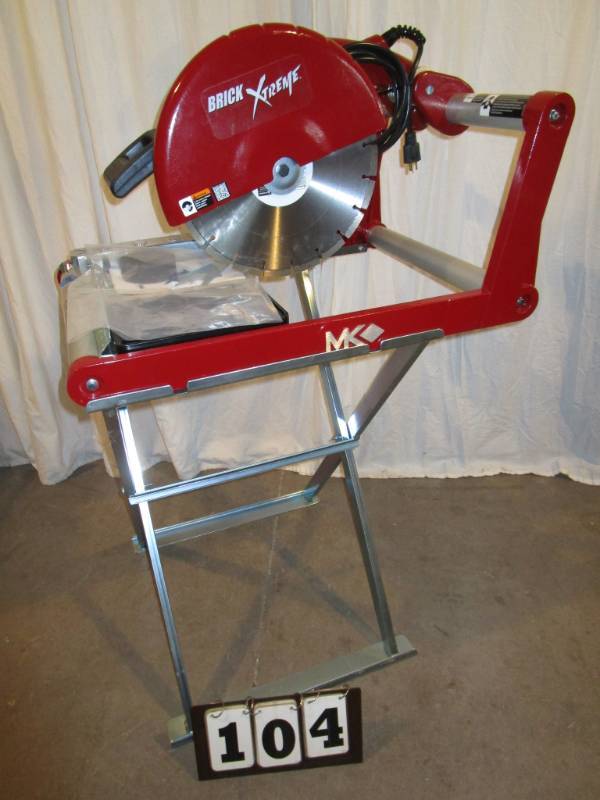 lot 104 image: MK Diamond 14 Wet & Dry Cutting Masonry Saw