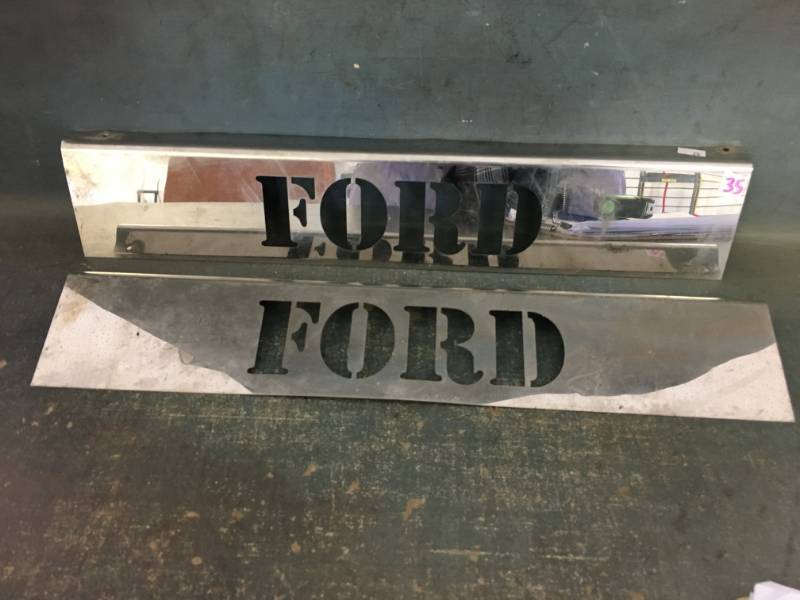 lot 35 image: Metal Ford Signs