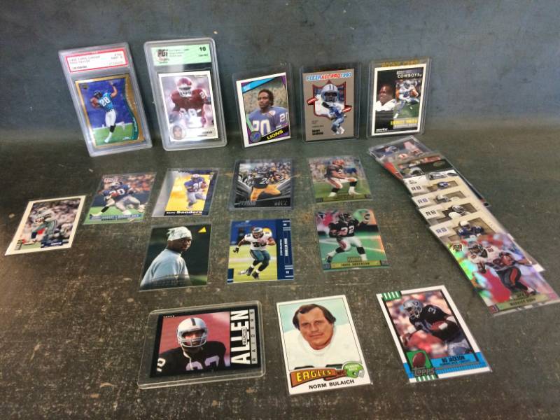 lot 60 image: Football Running Back Cards with Graded Peterson Rookie, Sanders, Sims & more