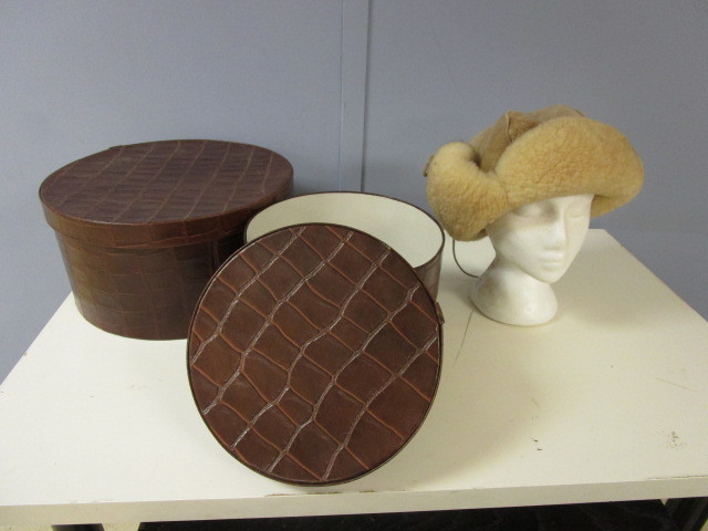 lot 528 image: SHEEPSKIN HAT AND HAT BOXES