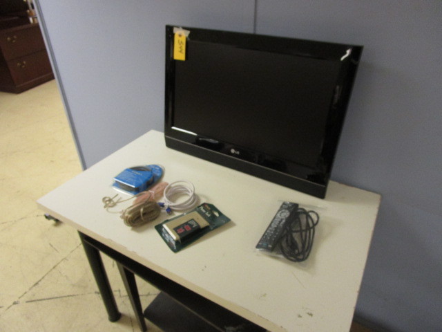 lot 544 image: 27 WALL MOUNT LG TV WITH REMOTE