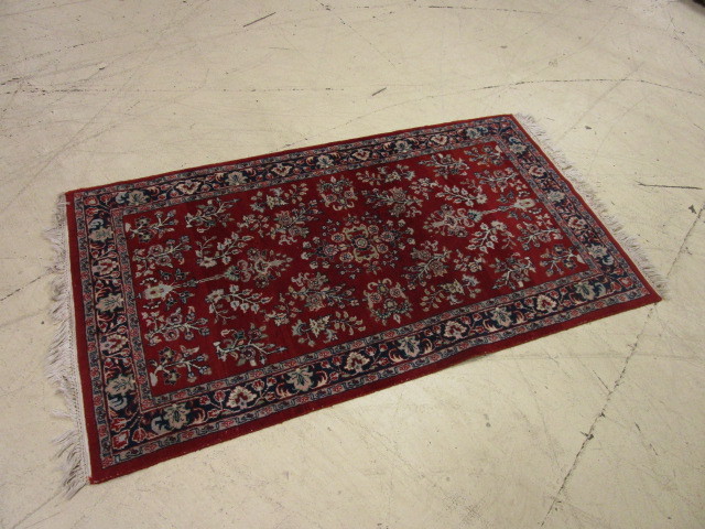 lot 448 image: WOOL HANDMADE RUG