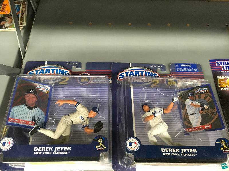 lot 126 image: Two Starting Lineup Derek Jeter Figurines