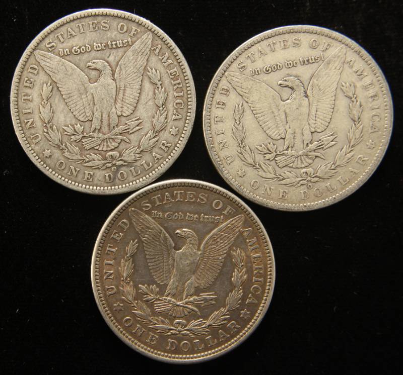 lot 23 image: 3 MORGAN SILVER DOLLARS 1888-O 1889-O 1921