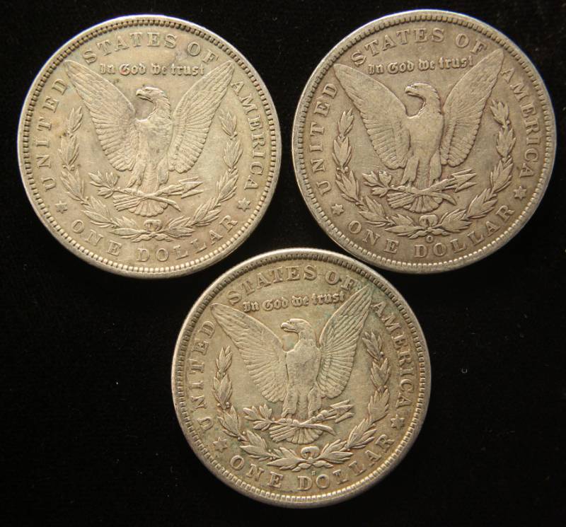 lot 32 image: 3 MORGAN SILVER DOLLARS 1896 1900-O 1921-S