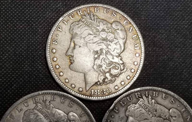 lot 15-B image: 3 MORGAN SILVER DOLLARS 1880-O 1884-O 1889-O