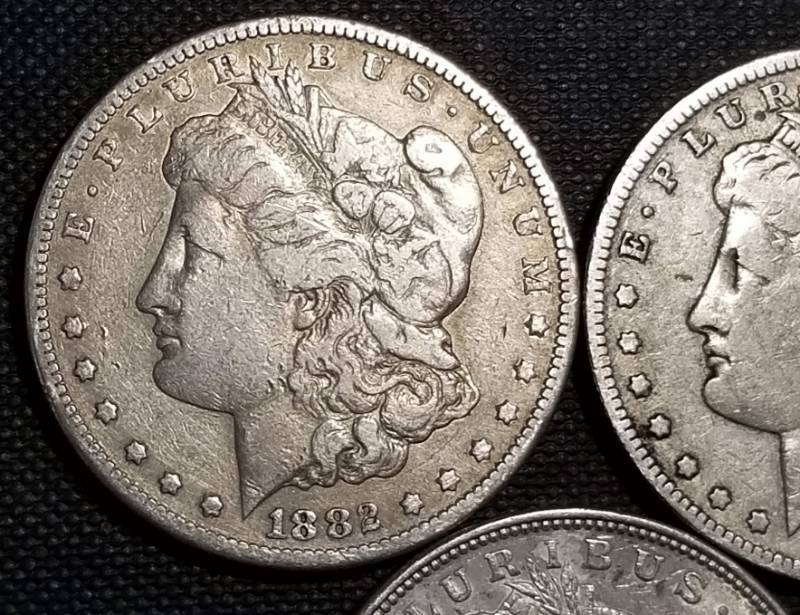 lot 21-B image: 3 MORGAN SILVER DOLLARS 1882-S 1891-O 1921
