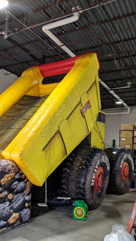 lot 206 image: Dump Truck Inflatable Slide