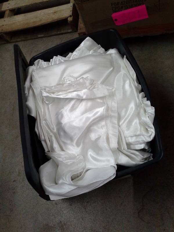lot 313 image: Lot of (70) White Satin Universal Chair Covers
