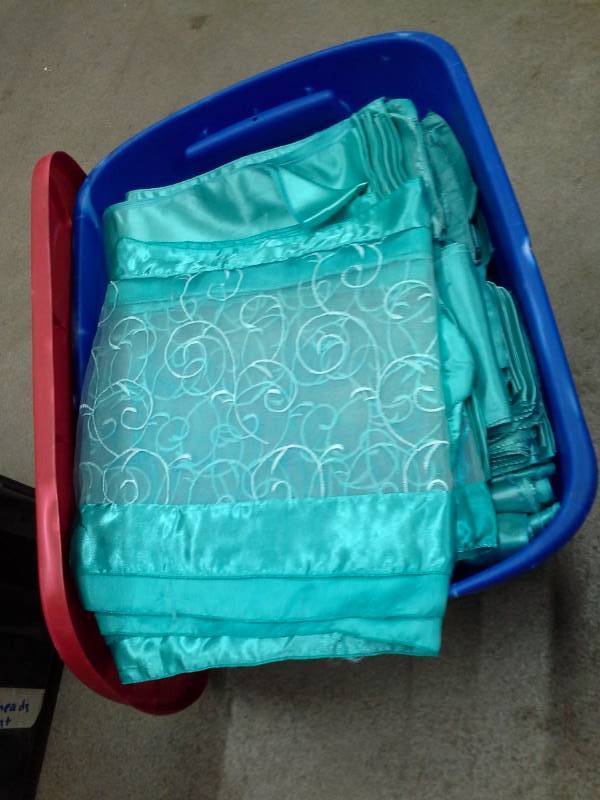 lot 314 image: Lot of (563) Light TurquoiseTiffany Blue Satin Chair Covers, Turquoise Satin and Organza Swirl Table Runners