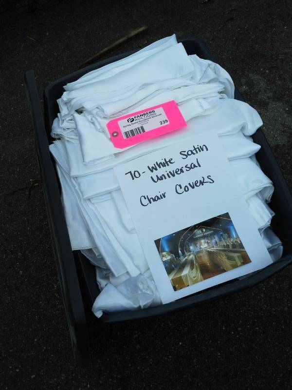 lot 239 image: Lot of (70) White Satin Universal Chair Covers