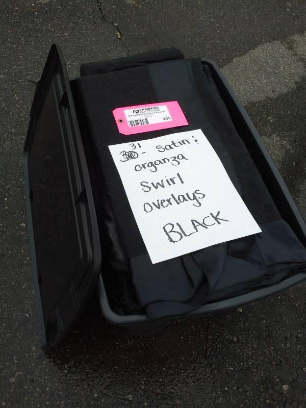 lot 235 image: Lot of (31) Black Satin and Organza Swirl Overlays