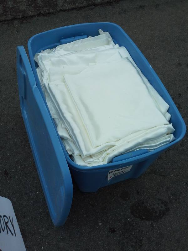 lot 254 image: Lot of (100) Ivory Satin Universal Chair Covers