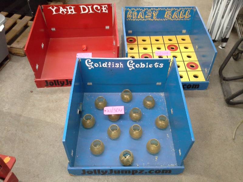 lot 304 image: Jolly Jumpz Goldfish Goblets Game, Krazy Ball Game, Yah Dice Game