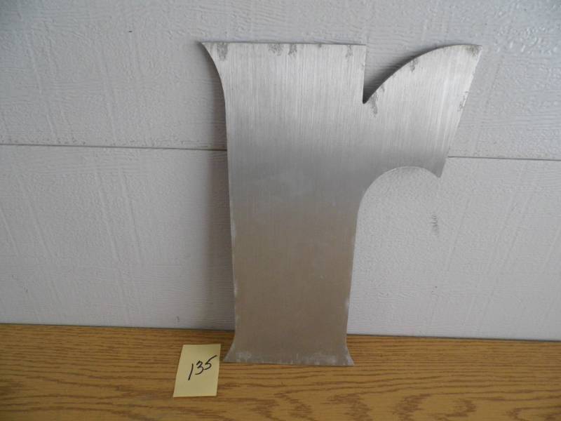 lot 135 image: Aluminum Letter R
