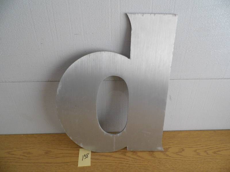 lot 138 image: Aluminum Letter D