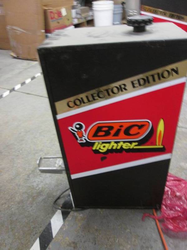 lot 9 image: Advertising Bic Lighter Dispenser C...
