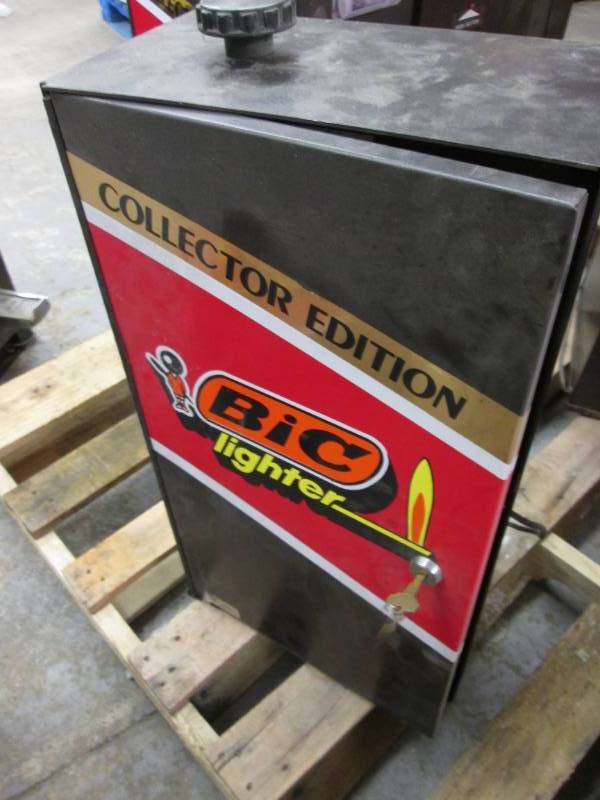 lot 15 image: Advertising Bic Lighter Dispenser C...