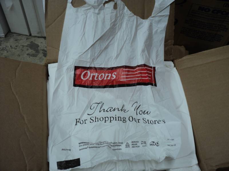 lot 320 image: Box of 1000 Thank you Plastic Bags...