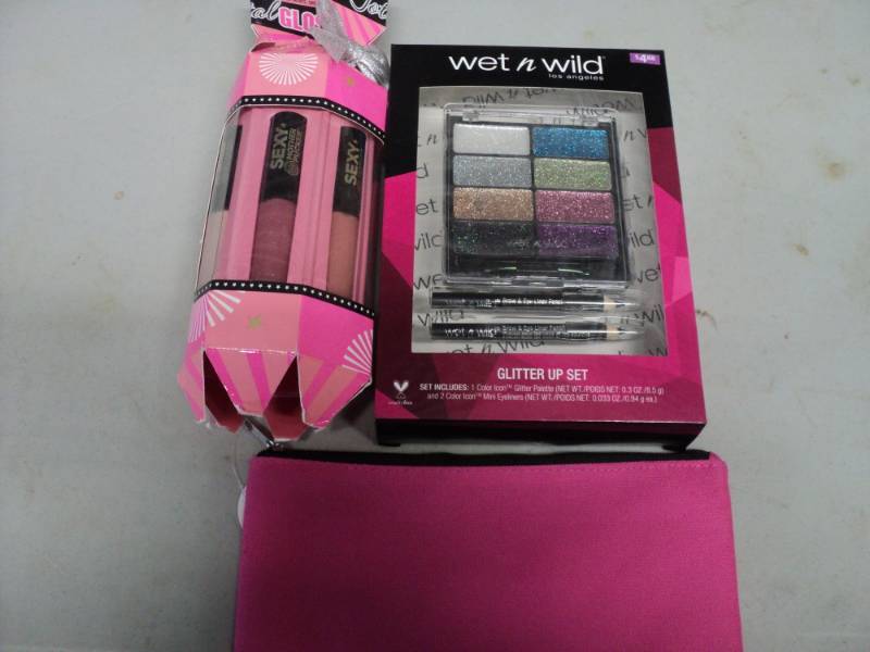 lot 61 image: Wet n Wild, Lip Gloss, and Purse...