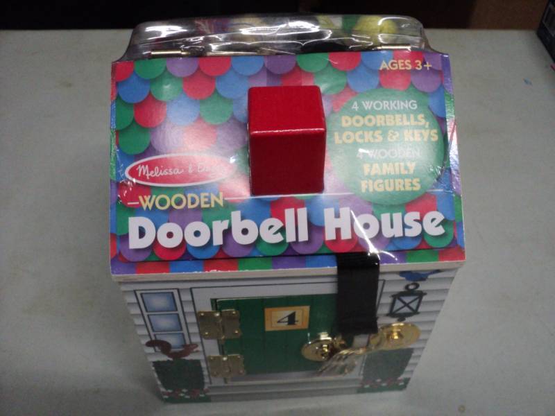 lot 73 image: Wooden Doorbell House...