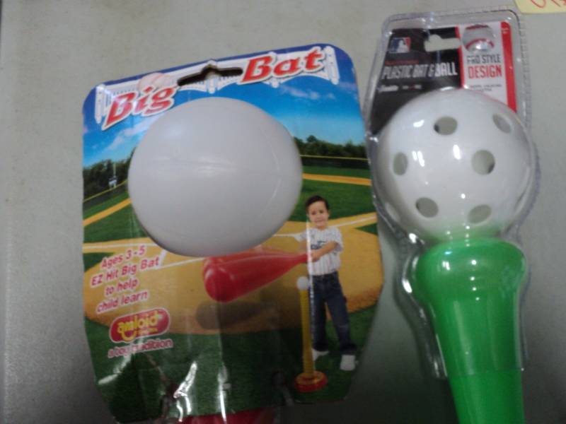 lot 154 image: 2 Plastic Bats with Balls...