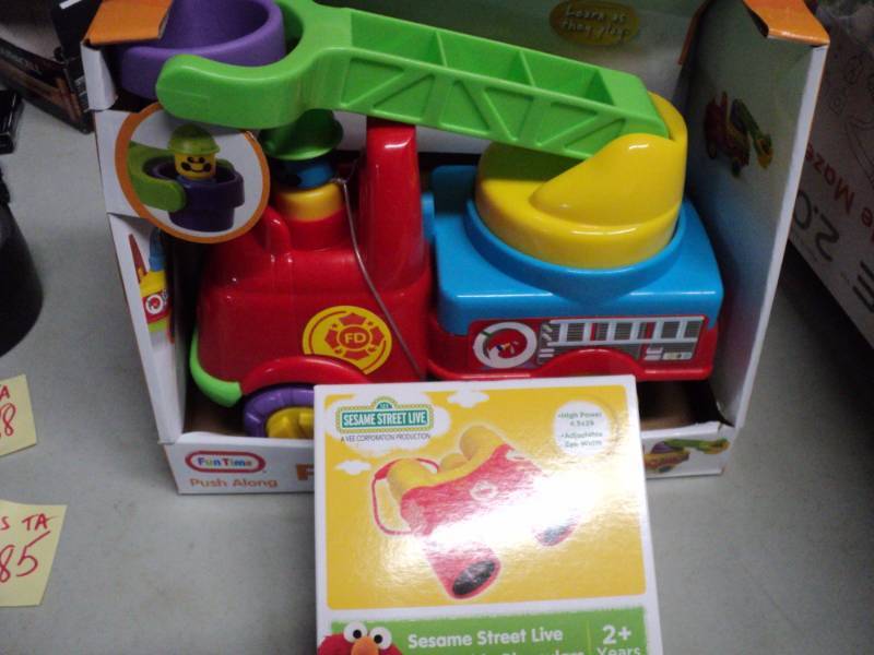lot 181 image: Fire Engine and Sesame Street binoc...